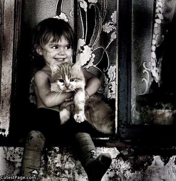 Little Kid With Cat