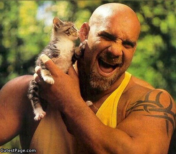 Big Guy With Cute Kitten